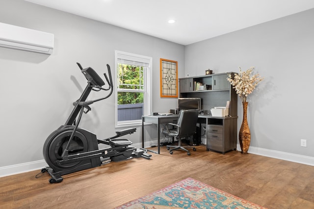 5834 Caney Ridge Cir, Ooltewah, TN 37363 - office featuring a wall unit AC, baseboards, wood finished floors, and recessed lighting