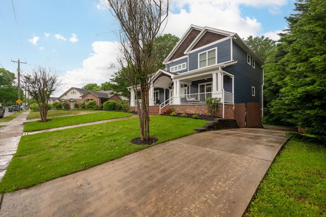 715 Forest Ave, Chattanooga, TN 37405 - craftsman-style house with a porch, driveway, and a front yard