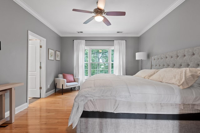 715 Forest Ave, Chattanooga, TN 37405 - bedroom featuring light wood finished floors, ornamental molding, baseboards, and ceiling fan