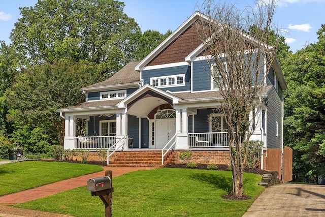 715 Forest Ave, Chattanooga, TN 37405 - craftsman house featuring covered porch and a front lawn
