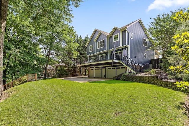 715 Forest Ave, Chattanooga, TN 37405 - rear view of property featuring stairs, a garage, and a wooden deck