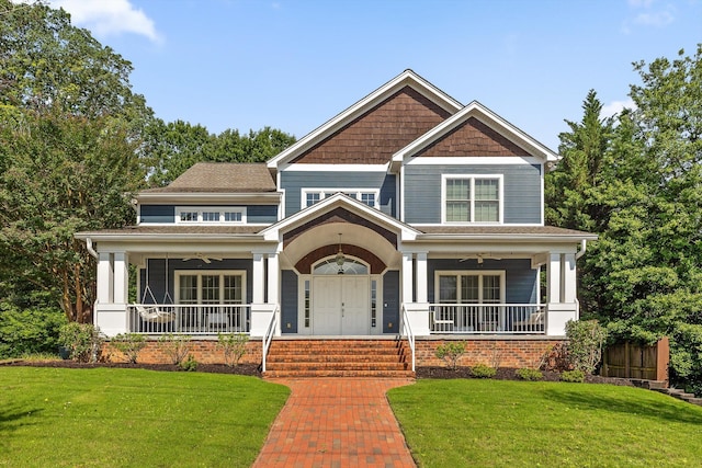 715 Forest Ave, Chattanooga, TN 37405 - craftsman house with a porch, ceiling fan, and a front yard