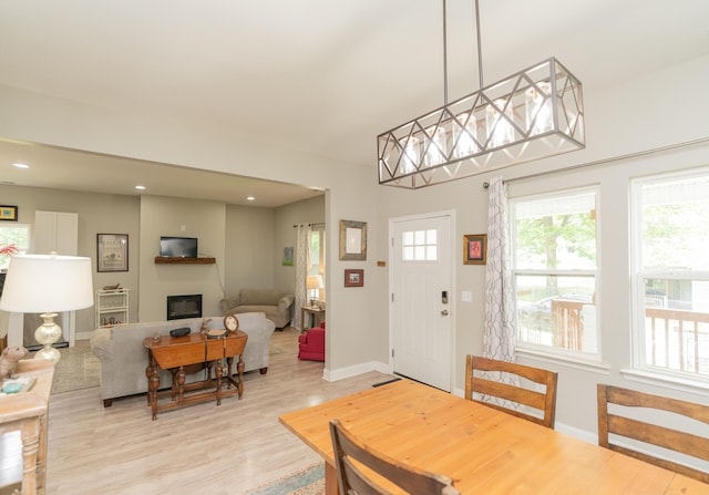 714 W 42nd St, Chattanooga, TN 37410 - dining area featuring light wood finished floors, baseboards, recessed lighting, and a glass covered fireplace
