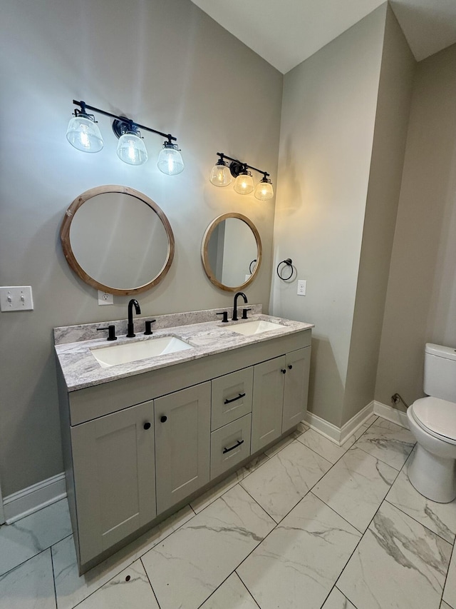 714 W 42nd St, Chattanooga, TN 37410 - bathroom with marble finish floors and double vanity