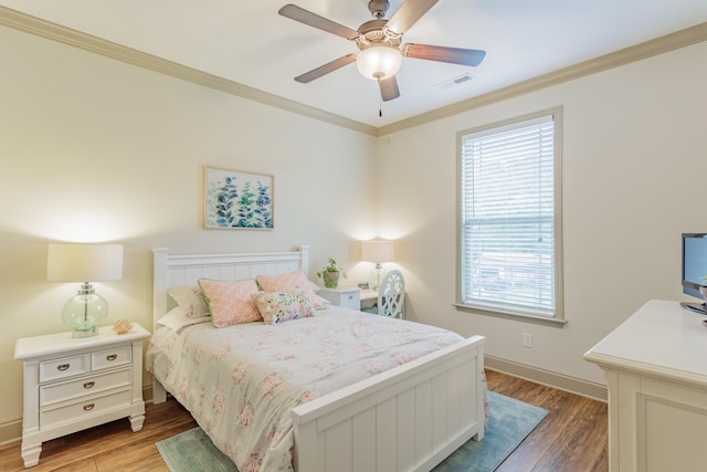 634 Gadd Rd, Hixson, TN 37343 - bedroom featuring multiple windows, light wood finished floors, ornamental molding, and baseboards