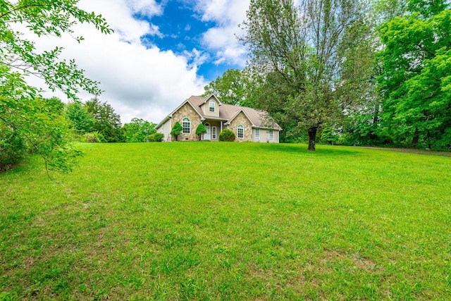 13709 Stormer Rd, Soddy Daisy, TN 37379 - view of front facade with a front lawn and brick siding
