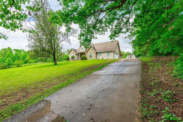 13709 Stormer Rd, Soddy Daisy, TN 37379 - view of front of home featuring concrete driveway and a front lawn
