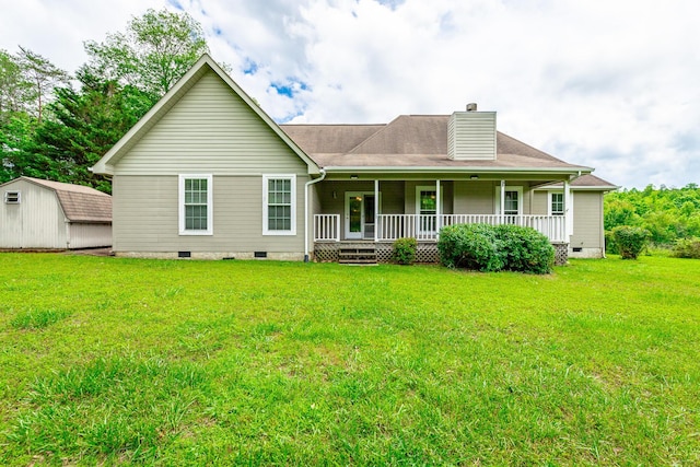 13709 Stormer Rd, Soddy Daisy, TN 37379 - rear view of property with crawl space, covered porch, a storage shed, a chimney, and an outdoor structure