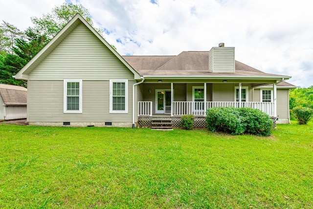 13709 Stormer Rd, Soddy Daisy, TN 37379 - back of house with crawl space, covered porch, a chimney, and a lawn