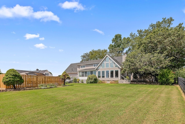 back of property featuring a chimney