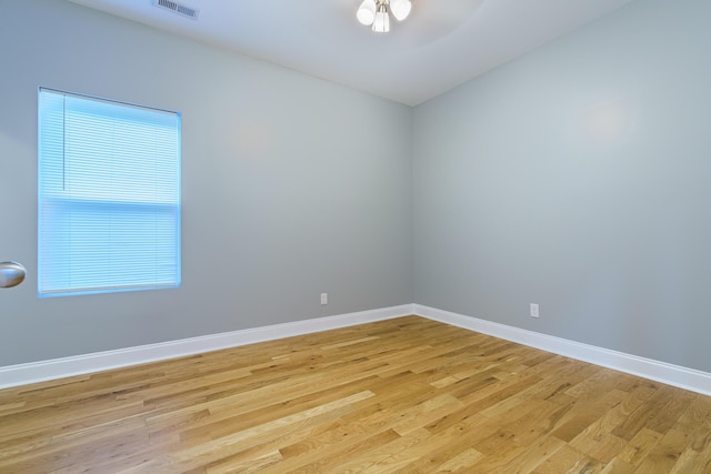 11 Woodvale Ave, Chattanooga, TN 37411 - empty room featuring light wood-style flooring, baseboards, and a ceiling fan