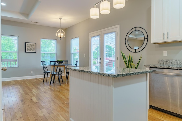 11 Woodvale Ave, Chattanooga, TN 37411 - kitchen featuring stainless steel dishwasher, white cabinetry, light wood-style flooring, and light stone counters