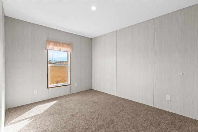 view of carpeted spare room