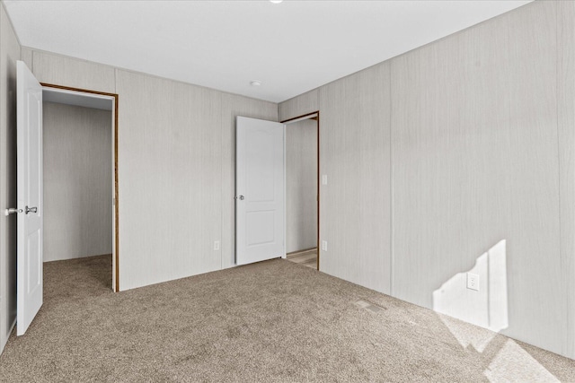 unfurnished bedroom with carpet flooring