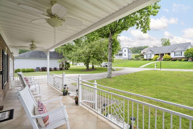 12204 Plow Ln, Soddy Daisy, TN 37379 - view of patio with ceiling fan, covered porch, and a residential view