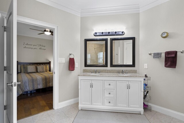 12204 Plow Ln, Soddy Daisy, TN 37379 - ensuite bathroom featuring ornamental molding, tile patterned floors, baseboards, and double vanity