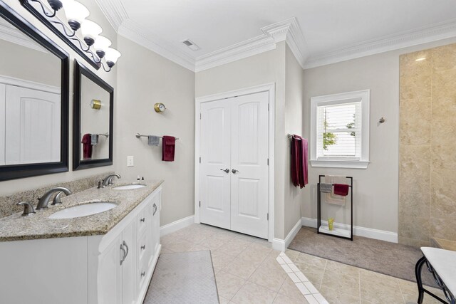 12204 Plow Ln, Soddy Daisy, TN 37379 - full bath with tile patterned flooring, ornamental molding, double vanity, and baseboards