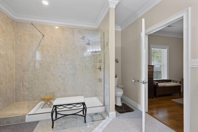 12204 Plow Ln, Soddy Daisy, TN 37379 - bathroom with toilet, ornamental molding, a stall shower, connected bathroom, and tile patterned flooring