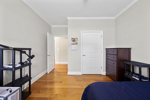 12204 Plow Ln, Soddy Daisy, TN 37379 - bedroom featuring ornamental molding, light wood-style floors, and baseboards