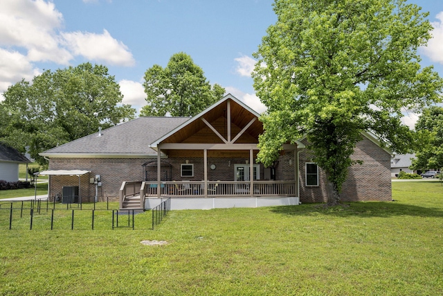 12204 Plow Ln, Soddy Daisy, TN 37379 - back of house with brick siding and a deck