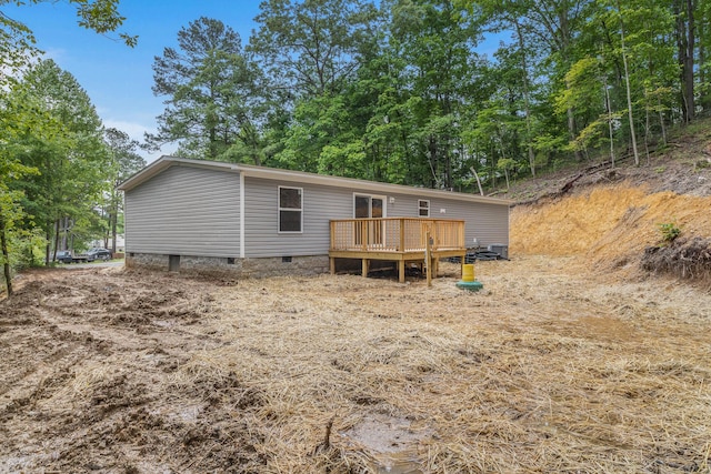398 Jodie Ln, Dayton, TN 37321 - rear view of house with a wooden deck and crawl space