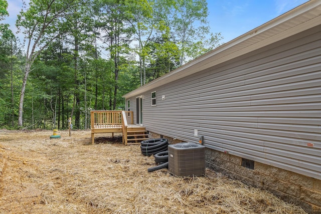 398 Jodie Ln, Dayton, TN 37321 - view of yard with a wooden deck and central AC
