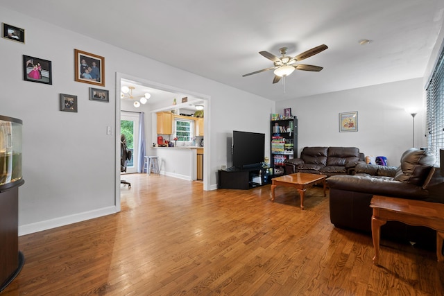 5007 Florida Ave, Chattanooga, TN 37409 - living room featuring a ceiling fan, light wood-style floors, and baseboards