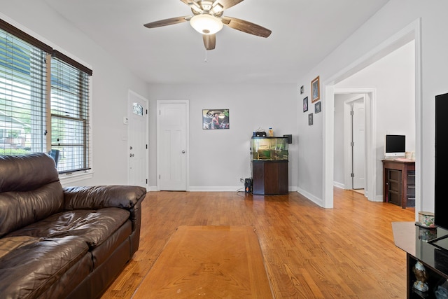 5007 Florida Ave, Chattanooga, TN 37409 - living room with light wood-style flooring, a ceiling fan, and baseboards