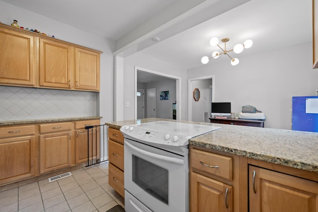 5007 Florida Ave, Chattanooga, TN 37409 - kitchen featuring white electric range oven, light tile patterned flooring, tasteful backsplash, a chandelier, and light stone counters