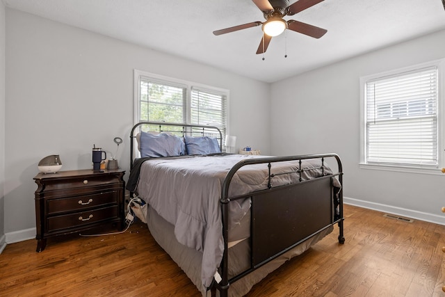 5007 Florida Ave, Chattanooga, TN 37409 - bedroom featuring wood finished floors, baseboards, and a ceiling fan