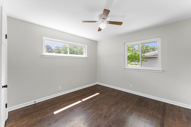 735 James Ave, Chattanooga, TN 37421 - unfurnished room with plenty of natural light, baseboards, and wood finished floors