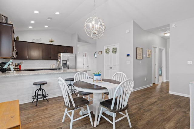 dining area with a chandelier, dark wood-style floors, high vaulted ceiling, baseboards, and recessed lighting