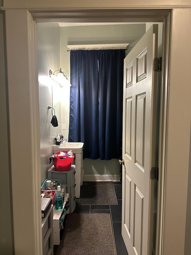 bathroom with vanity and tile patterned flooring