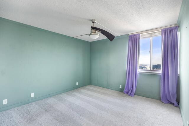 1131 Stringers Ridge Rd Unit 11G, Chattanooga, TN 37405 - unfurnished room with a ceiling fan, carpet flooring, a textured ceiling, and baseboards