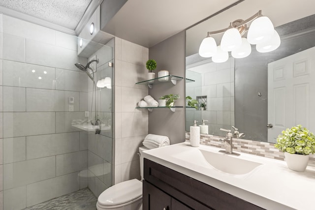 1131 Stringers Ridge Rd Unit 11G, Chattanooga, TN 37405 - full bathroom featuring walk in shower, vanity, toilet, and backsplash