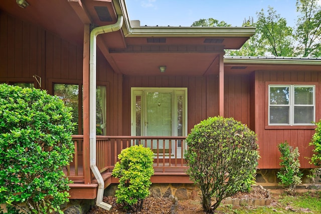6601 Hunter Rd, Harrison, TN 37341 - doorway to property with metal roof and a porch