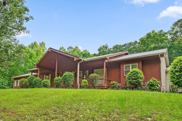 6601 Hunter Rd, Harrison, TN 37341 - ranch-style home featuring a front yard and metal roof