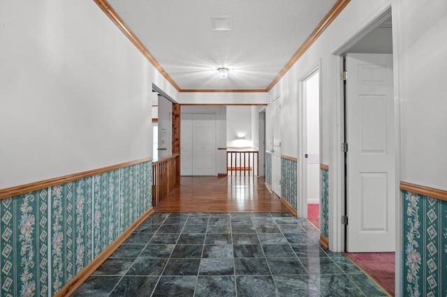 6601 Hunter Rd, Harrison, TN 37341 - hall with a wainscoted wall, ornamental molding, wallpapered walls, and a textured ceiling