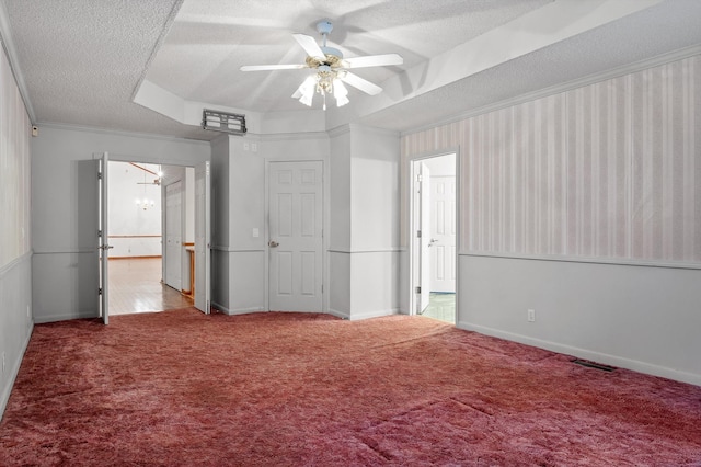 6601 Hunter Rd, Harrison, TN 37341 - unfurnished bedroom with a textured ceiling, carpet, ornamental molding, baseboards, and a ceiling fan