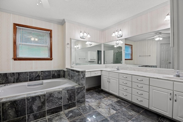 6601 Hunter Rd, Harrison, TN 37341 - full bath featuring a ceiling fan, a shower stall, a textured ceiling, double vanity, and ornamental molding