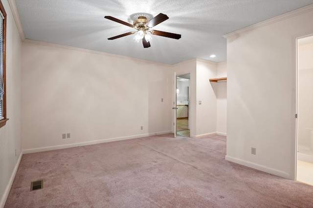 6601 Hunter Rd, Harrison, TN 37341 - carpeted empty room with ceiling fan, a textured ceiling, crown molding, baseboards, and recessed lighting