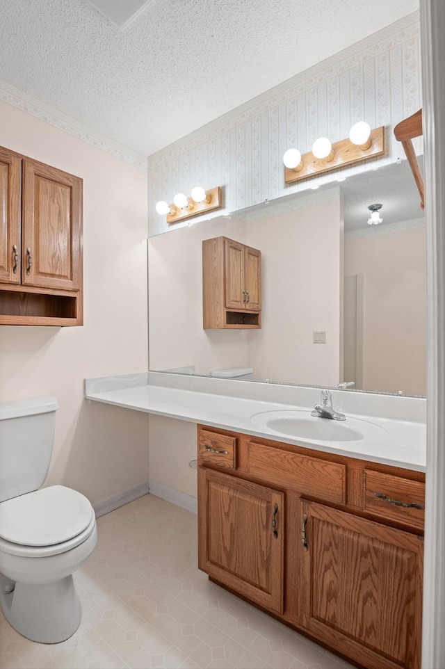 6601 Hunter Rd, Harrison, TN 37341 - bathroom featuring a textured ceiling, toilet, vanity, ornamental molding, and tile patterned floors