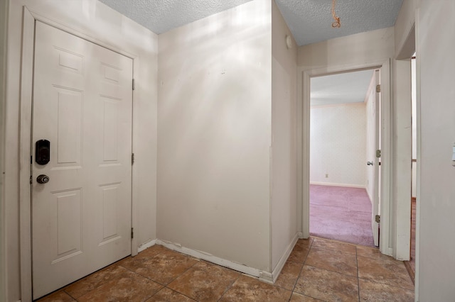 6601 Hunter Rd, Harrison, TN 37341 - entryway with a textured ceiling, baseboards, and stone finish floors