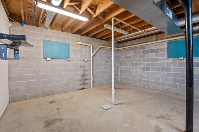 6601 Hunter Rd, Harrison, TN 37341 - unfinished basement with concrete block wall
