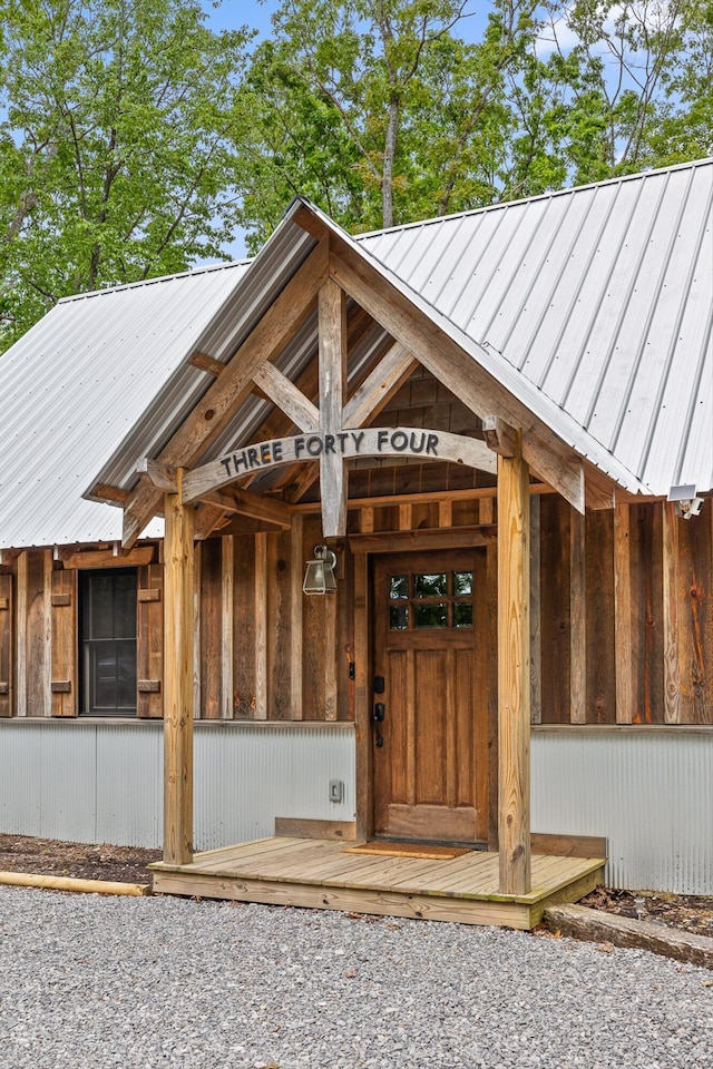 property entrance with metal roof