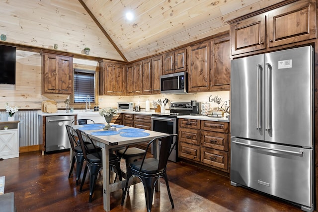 kitchen featuring stainless steel appliances, wooden ceiling, finished concrete flooring, light countertops, and brown cabinets