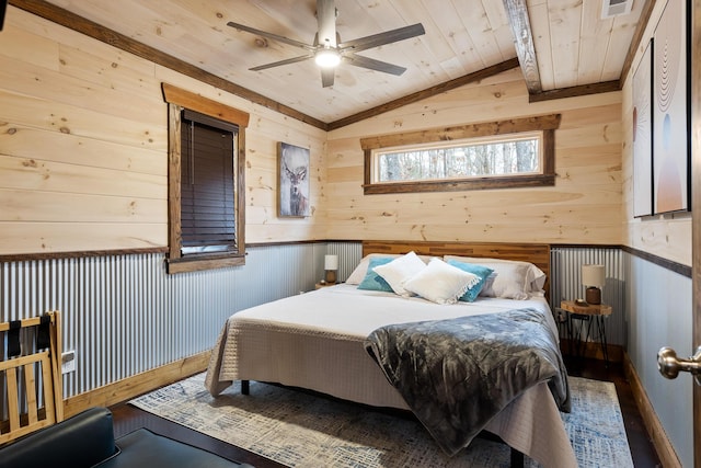 bedroom with wooden ceiling, wood finished floors, wooden walls, vaulted ceiling, and ceiling fan