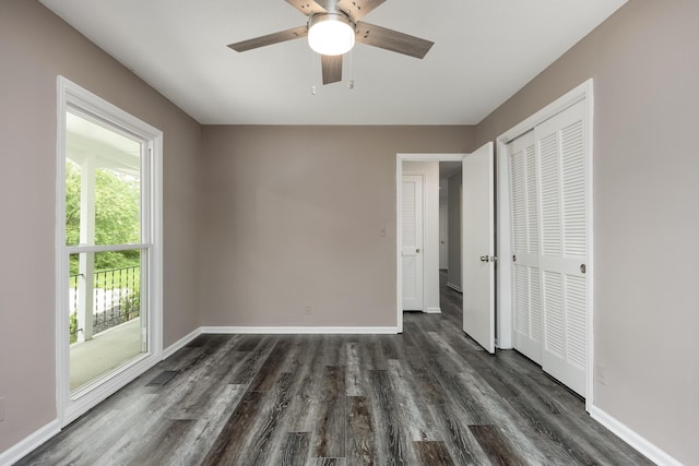 11306 Hixson Pike, Soddy Daisy, TN 37379 - unfurnished bedroom featuring dark wood finished floors and baseboards