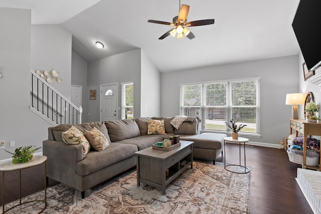 6837 Benwood Dr, Ooltewah, TN 37363 - living room with stairway, wood finished floors, a ceiling fan, baseboards, and high vaulted ceiling