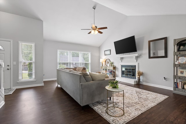 6837 Benwood Dr, Ooltewah, TN 37363 - living area with a glass covered fireplace, high vaulted ceiling, ceiling fan, dark wood finished floors, and healthy amount of natural light